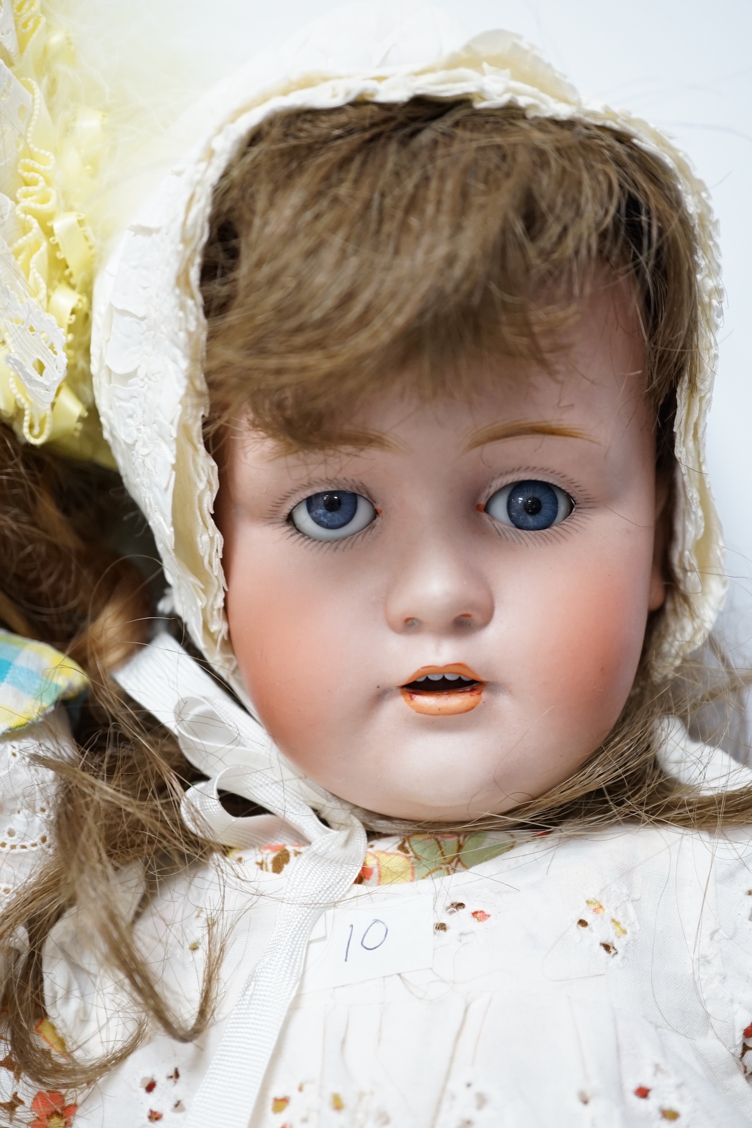A Kestner JDK 168 bisque doll, 65cm and an AM390 doll with bisque head, 65cm
